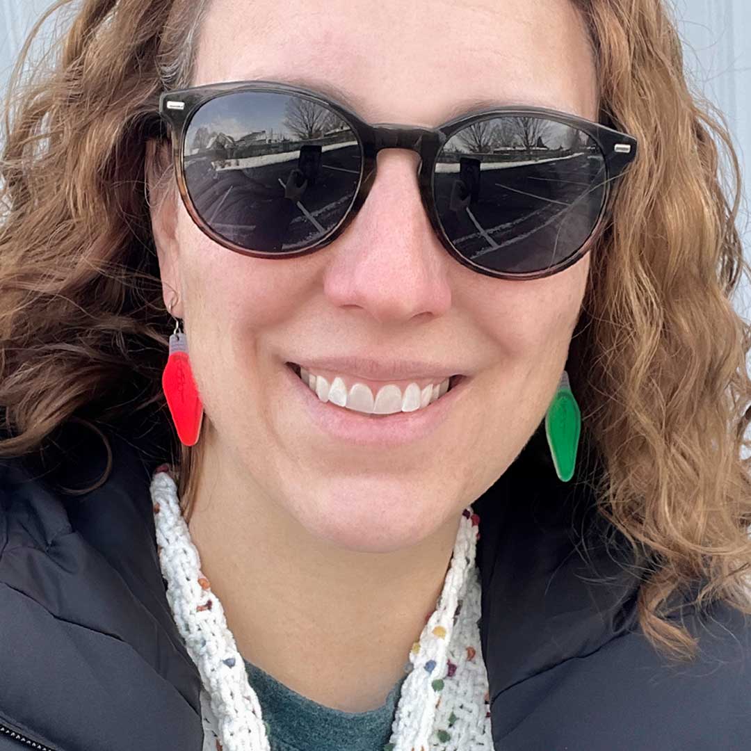 girl wearing red and green vintage light bulb earrings for Christmas by ColorUpLife.