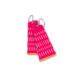 Pair of magenta pink earrings with a geometric pattern on a white background.