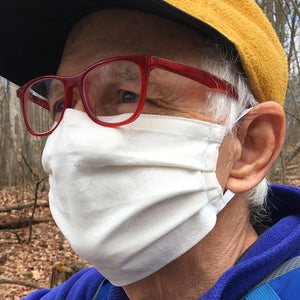 Man wearing a ColorUpLife fog reducing cloth face mask to help with his glasses.