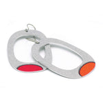 Large hoop earrings in gray with mismatched red and orange dots by ColorUpLife.
