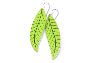 A pair of long lime green leaf earrings by ColorUpLife.