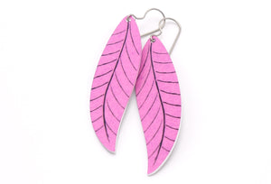 A pair of long dusty pink leaf earrings by ColorUpLife.