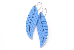 A pair of long sky blue leaf earrings by ColorUpLife.