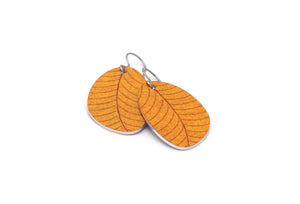 A pair of small leaf earrings in golden yellow by ColorUpLife.