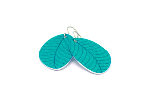 A pair of small leaf earrings in turquoise by ColorUpLife.