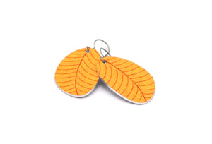 A pair of small leaf earrings in yellow by ColorUpLife.