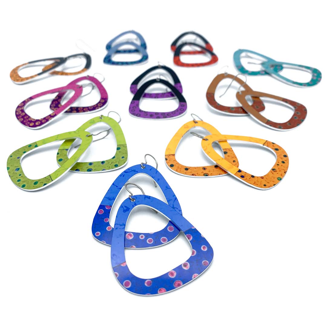 Big triangle earrings presented in nine bold colors by ColorUpLife.