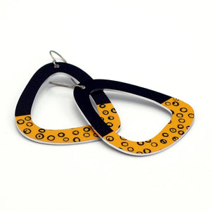 Large black and yellow triangle earrings with bold polka dots by ColorUpLife.