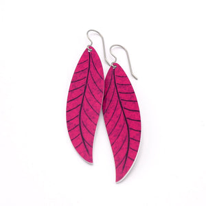 A pair of long magenta pink leaf earrings by ColorUpLife.