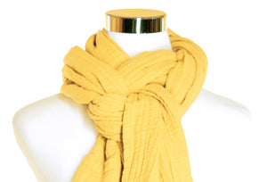 Close-up knot shown on a buttercup yellow cotton scarf by ColorUpLife